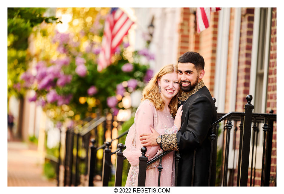 Katie and Abdus by the houses and American flag in the background, Alexandria, Virginia