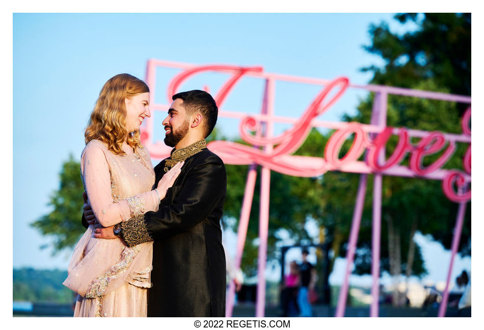 Katie and Abdus in front of the LOVE sign in Alexandria, Virginia