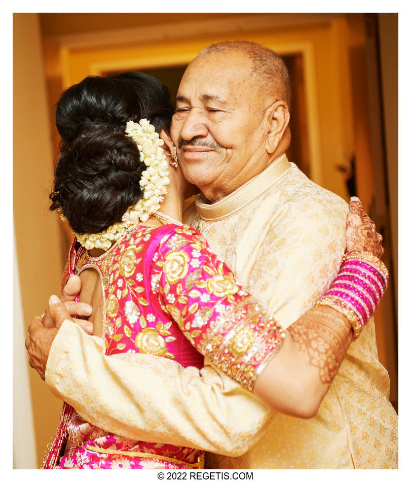 Bride hugging her father