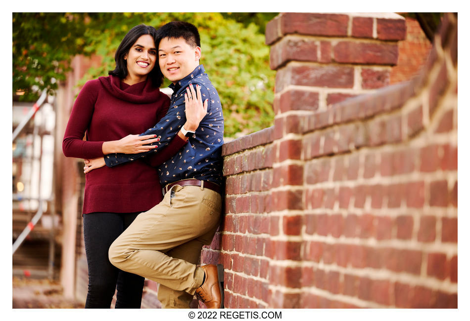 Anjali and Eric Engagement Portrait by the brick wall in Alexandria, VA
