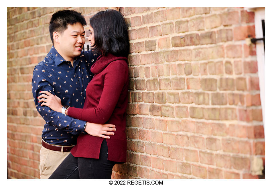 Anjali and Eric Engagement Portrait by red brick wall