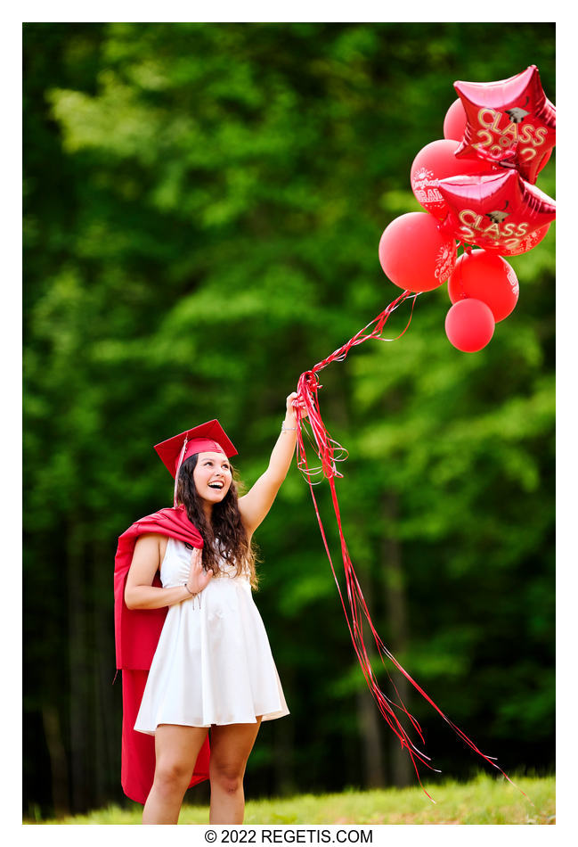 High School Senior Portrait with Red Balloons