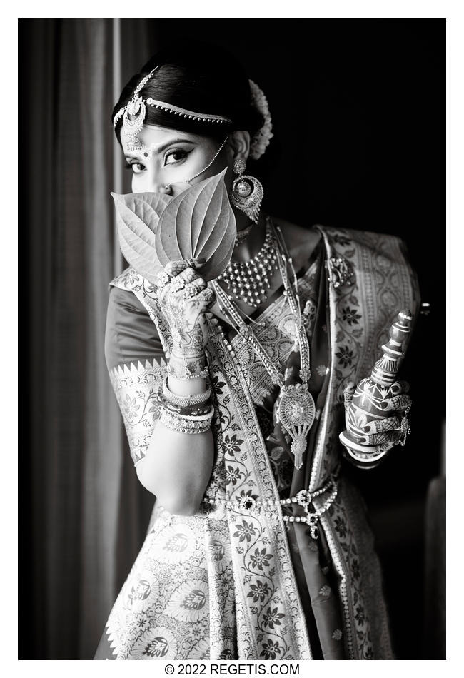 Balcka and White Portrait of a traditional Indian Bengali Bride with the beetle nut leaves.