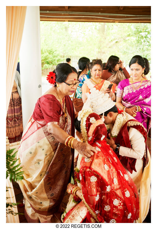 Mother of the bride offering her blessings to the newly married couple.
