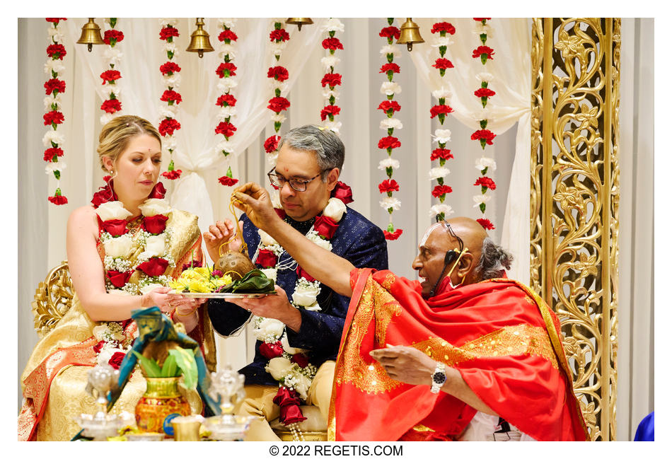 Bride and Groom performing Hindu rituals at their Indian Wedding