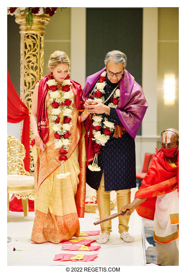 Bride and Groom walking seven steps at their Hindu Wedding Ceremony
