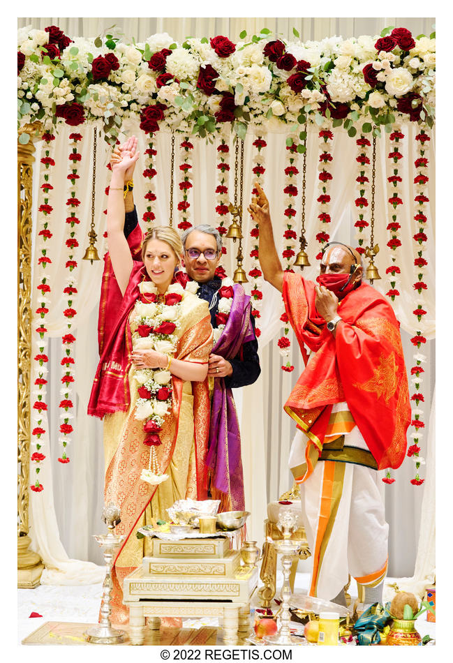 Bride and Groom pointing to Arundati Nakshathram at their Indian Wedding