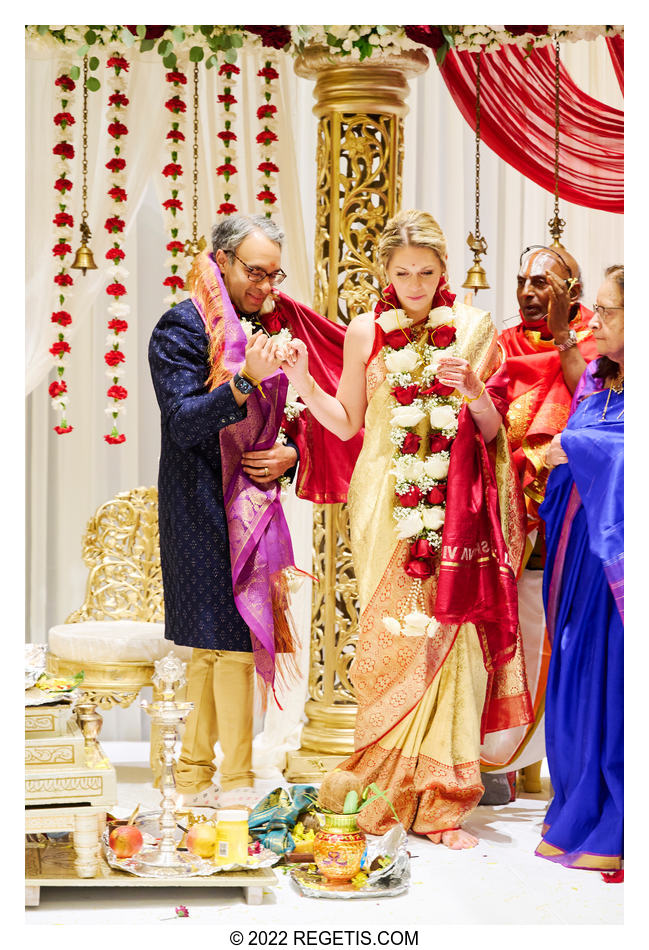 Bride and Groom walking around the fire at their Hindu Ceremony