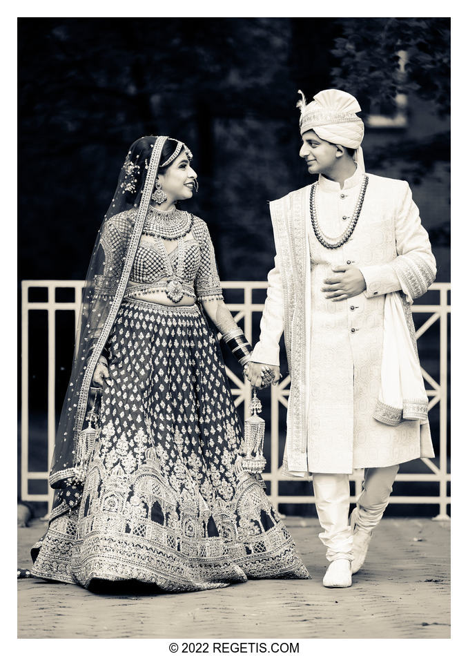 Black and White photo of Bride and Groom walking