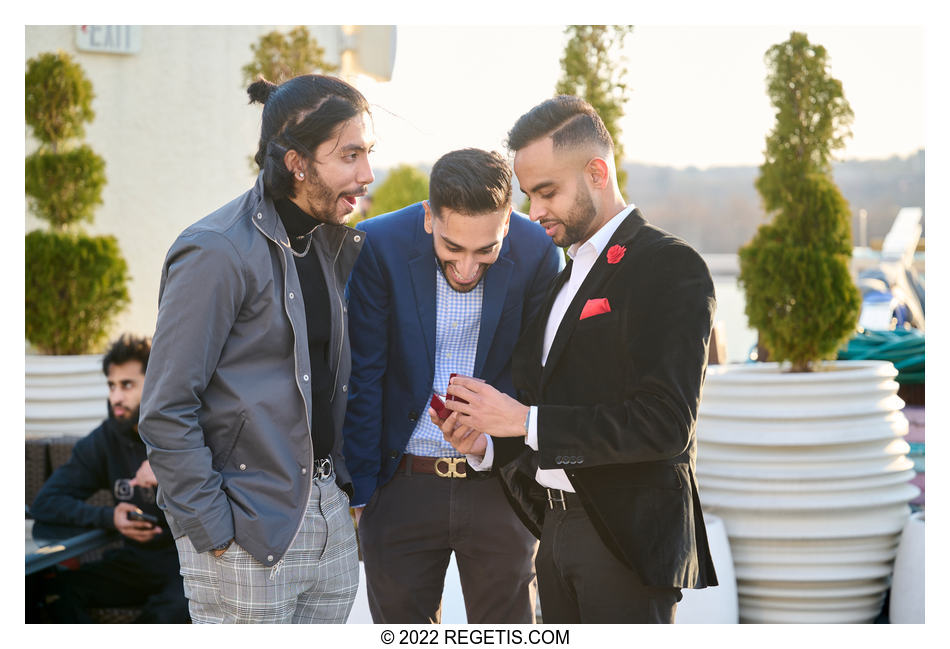 Kishan showing his ring to his friends.