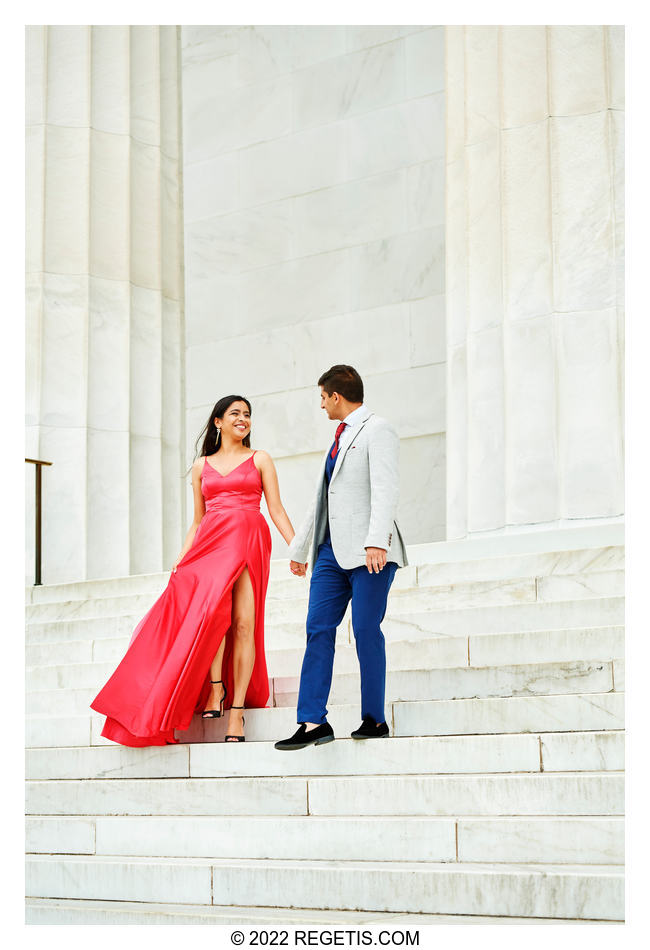 Engaged Couple walking down the steps at Lincoln Memorial