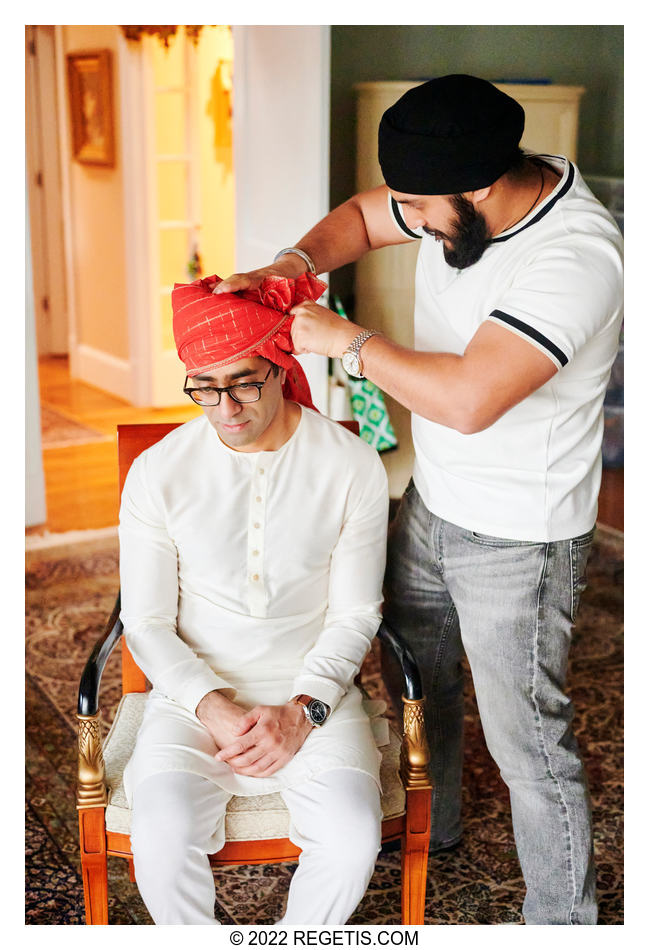 Indian groom getting his turban tied professionally
