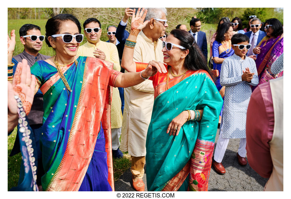 Guests dancing at the indian wedding baraat