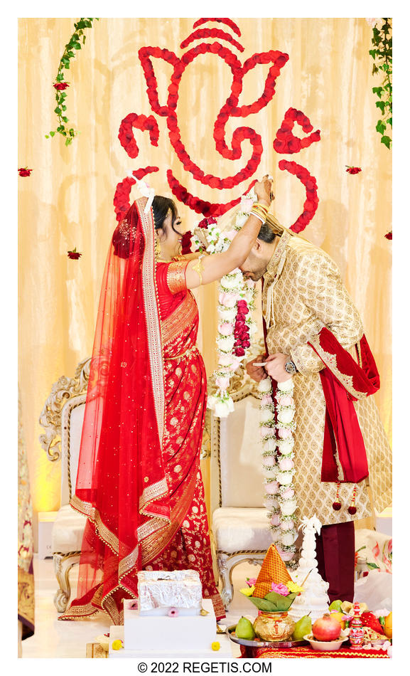 Tripali and Nitin exchanging garlands at their South Asian Wedding at the Conrad Hotel Washington