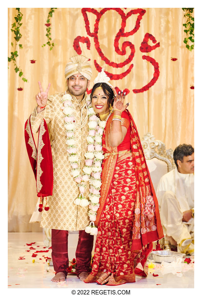 Tripali and Nitin showing off their wedding rings at their  South Asian Wedding at the Conrad Hotel Washington