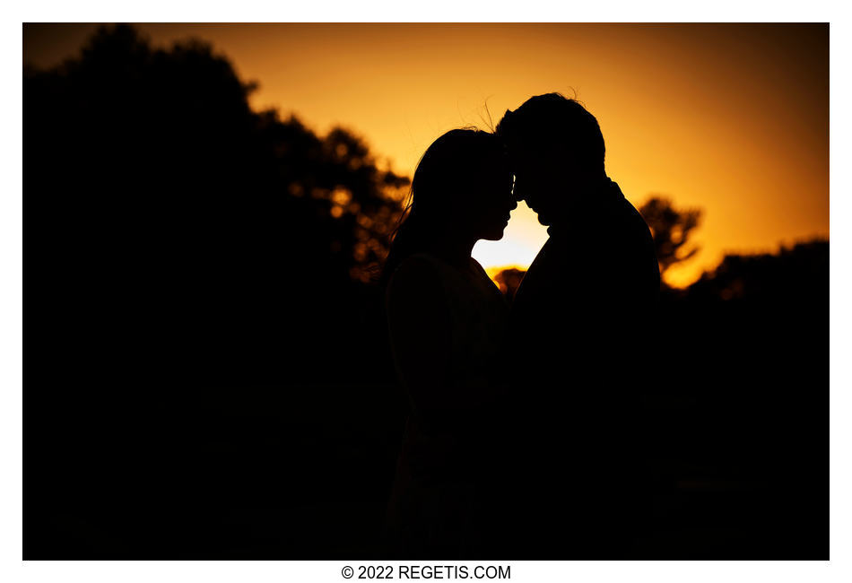 silhouette with sun setting behind Nitin and Tripali