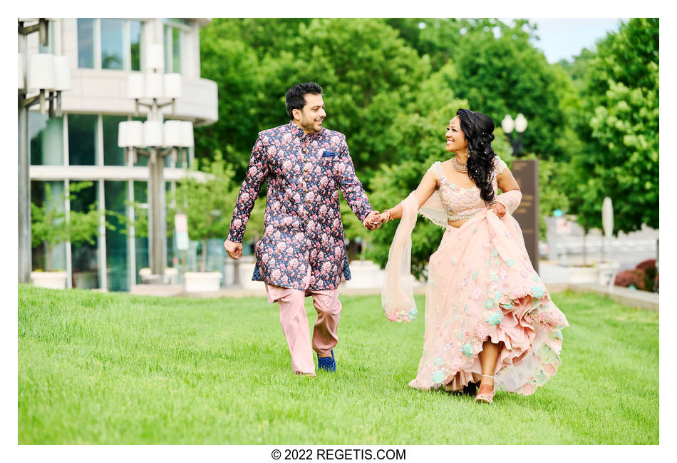 Tripali and Nitin were photographed while running in the grass at 101 Constitution AVE